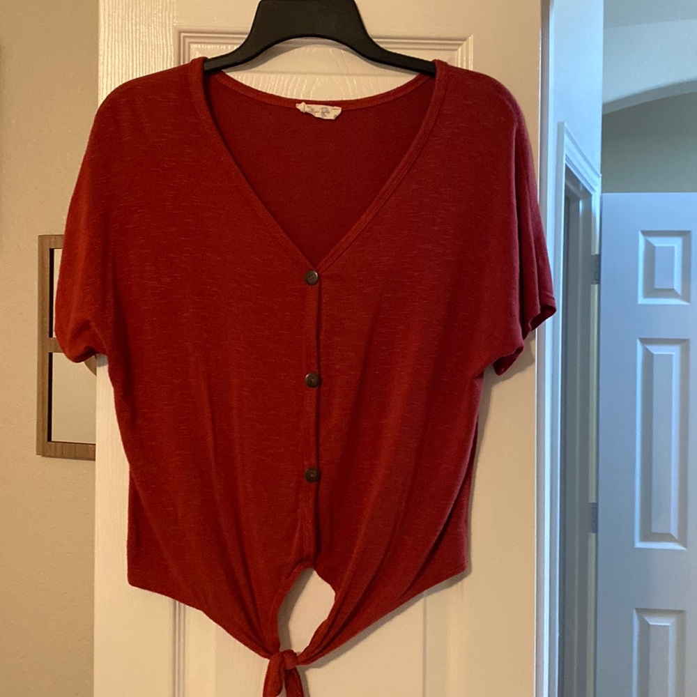 Maroon colored top with tie